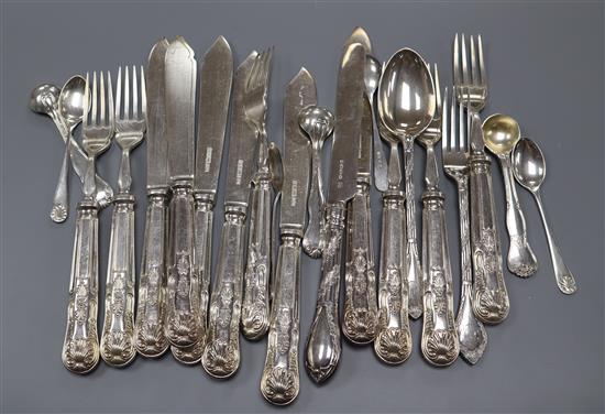 A Victorian silver christening spoon, knife and fork, London, 1890 and other flatware including six pairs of silver fish eaters.